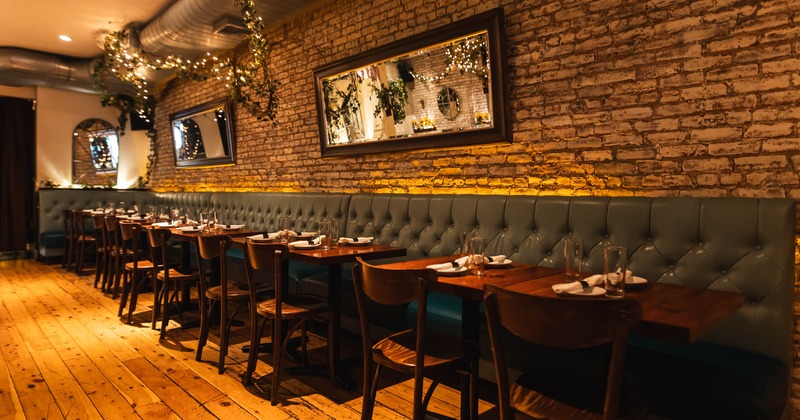 Interior, long booth, tables and chairs