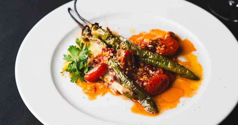 Long hot peppers with cheese and cherry tomatoes