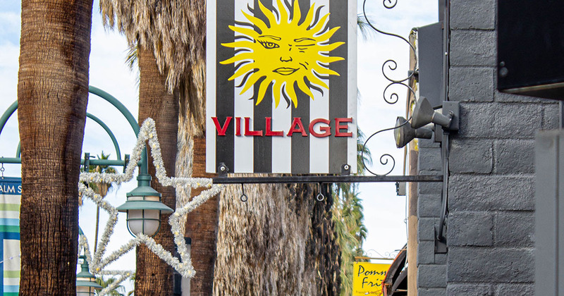 Exterior, details, The Village logo on a hanging sign