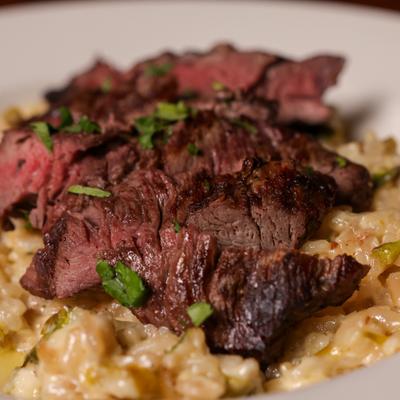 Filet Mignon on a bed of risotto.
