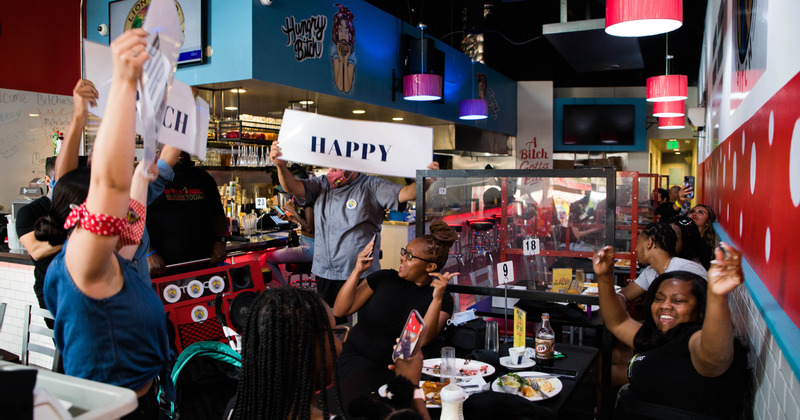 Employees helping celebrate customer's birthday