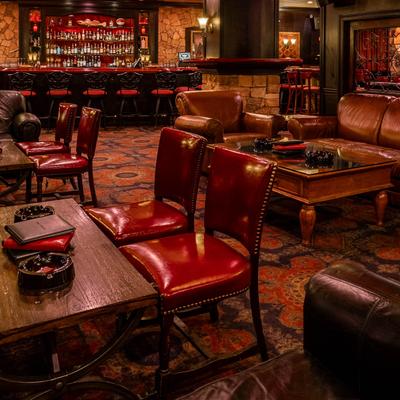 Interior, lounge area, comfortable sofas and armchairs with coffee tables.