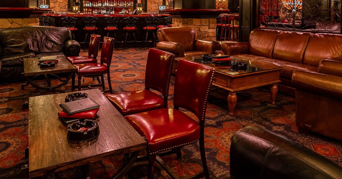 Interior, lounge area, comfortable sofas and armchairs with coffee tables