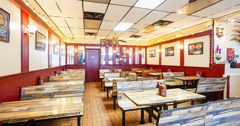 Interior space, dining area with wooden tables and benches