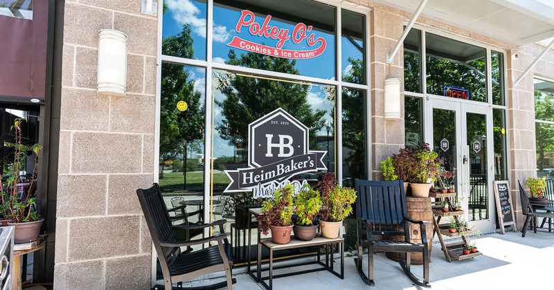 Exterior, entrance and seating area in front