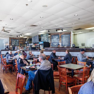City Limits Bakery and Cafe interior, guests in dining area.