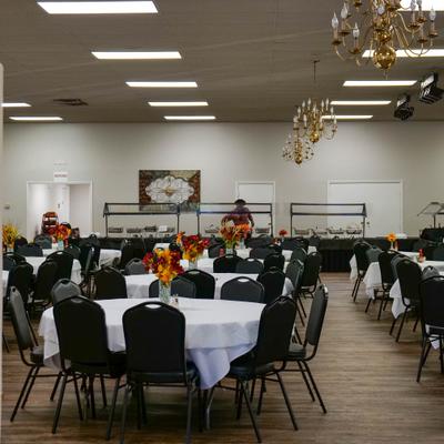 View at the tables decorated with flowers.