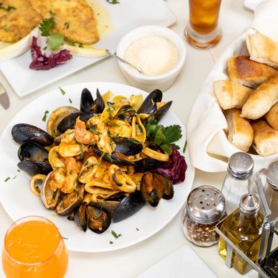 Various food and drinks on a table.