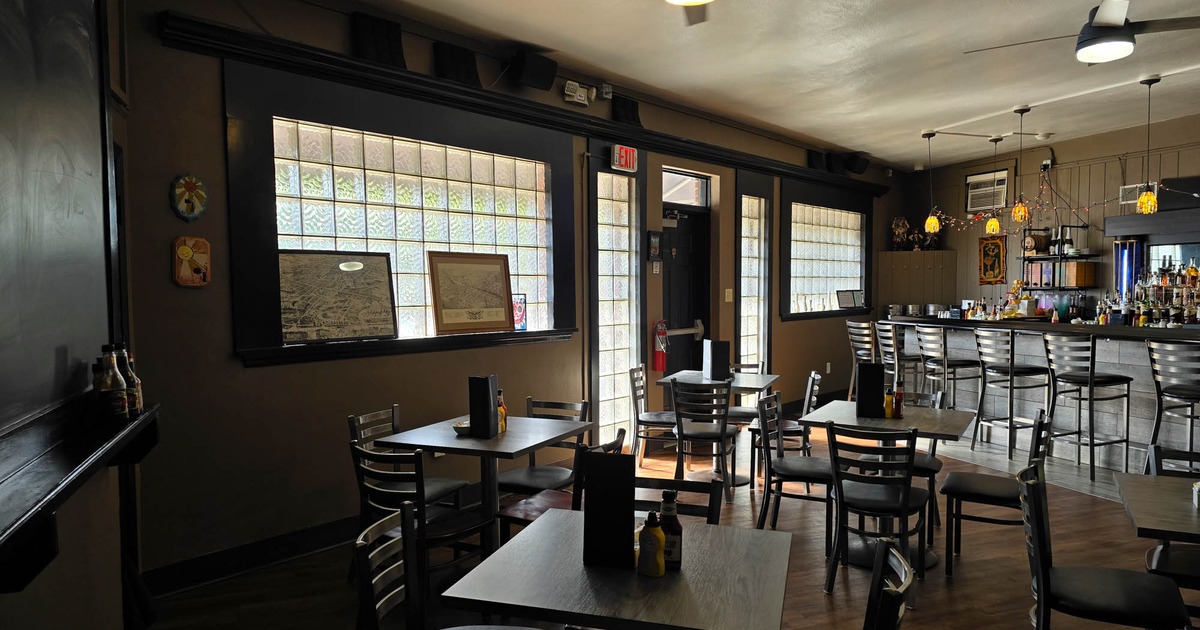 Interior, dining area, tables ready for guests