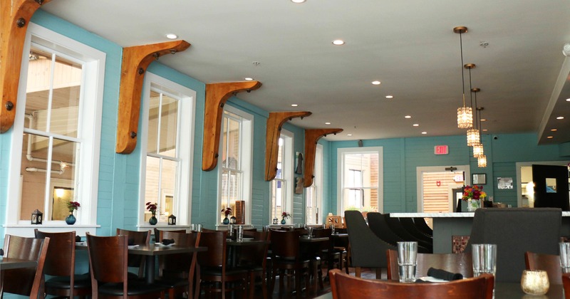 Interior, tables and chairs near windows