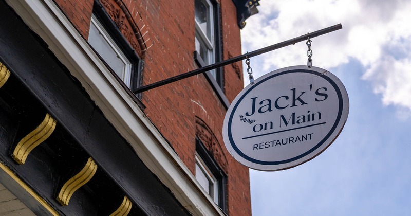 Exterior, the restaurant's hanging name sign