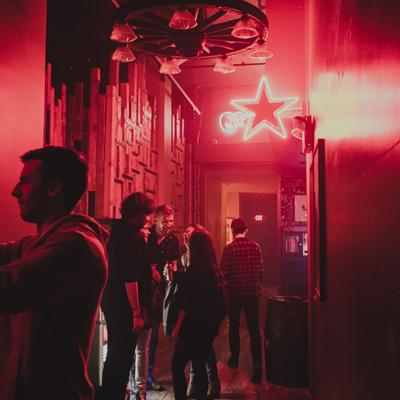 Guests having fun, dancing, restaurant interior