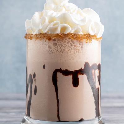 Chocolate drink with whipped cream.