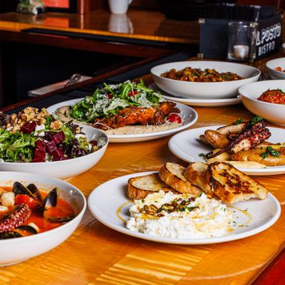 Assorted Italian dishes on a wooden table.