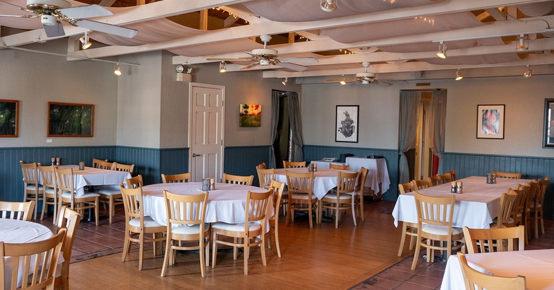 Restaurant interior, dining area with tables and chairs