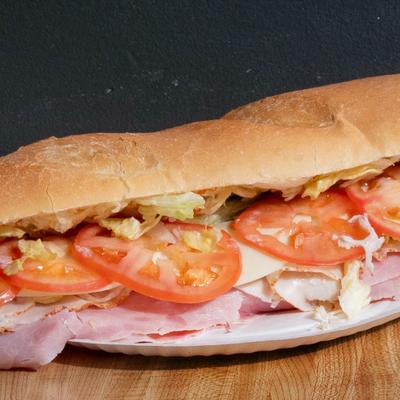 Club Sub sandwich with ham, cheese, lettuce and tomatoes.