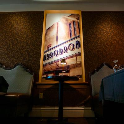 Speakeasy interior, elegant seating area.