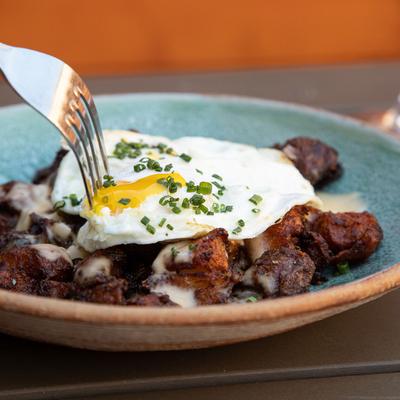 Grilled meat and fried egg