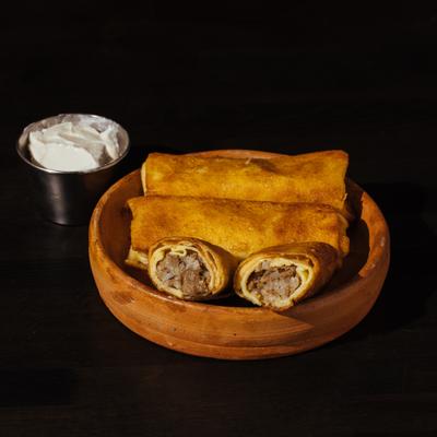 Rolled  meat crepes photo