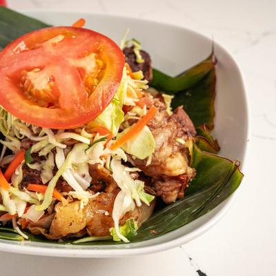 Nicaraguan beef, plantains and yuca, with shredded cabbage and tomato.