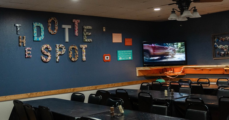 Interior, private room, seating area, Tv's on the wall