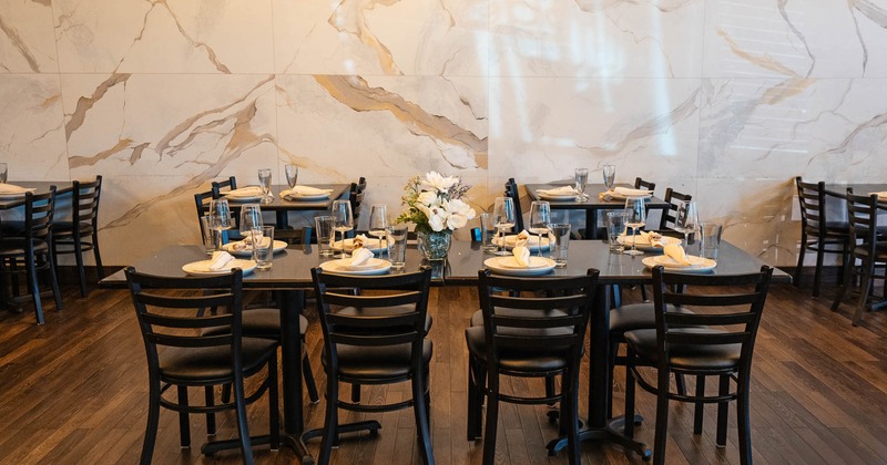 Interior, tables and chairs in dining area