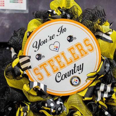 A handmade Pittsburgh Steelers deco mesh wreath.