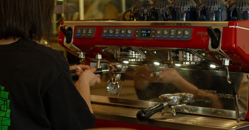 Barista pulling espresso shot at Wise Town Café Ottawa