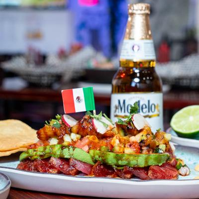 Shell-ah’s Ahi Tuna Plate and a bottle of Mexican beer.