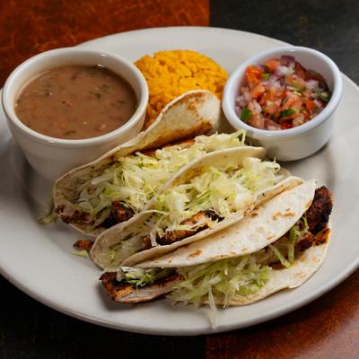 Soft Tacos - your choice of chicken , beef shrimp or jerk fish (regular or spicy).