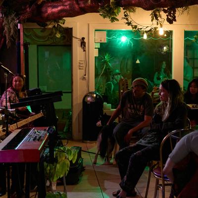 The audience enjoying live music.