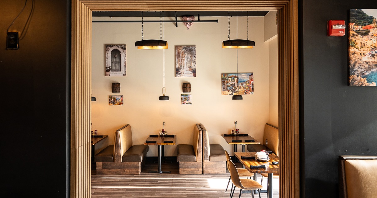 Cozy and modern interior dining area, view from the next room