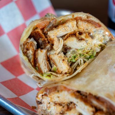Buffalo chicken wrap, close-up.