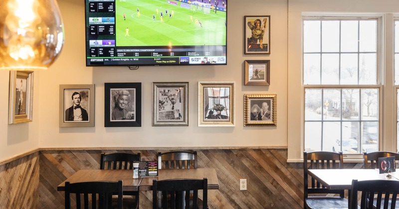 Seating area with TV's on the wall above