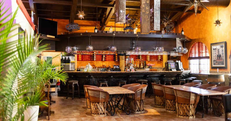 Interior, seating area with a bar in the back