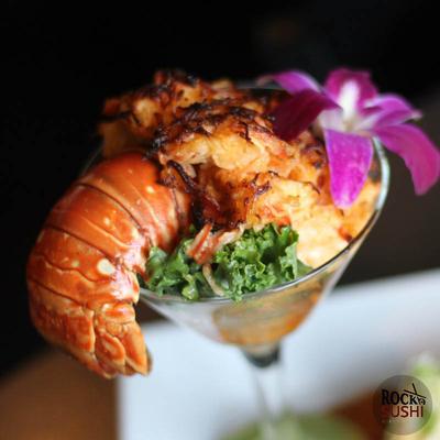 Lobster roll served in a martini glass.