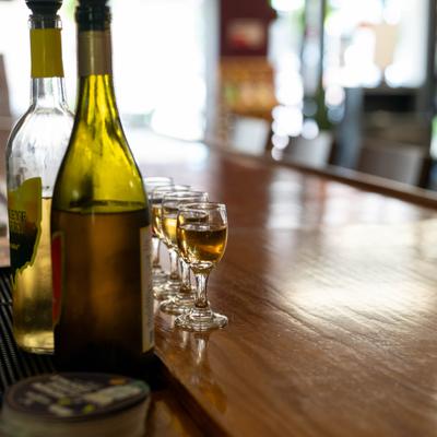 Liquor bottles and small stemmed glasses.