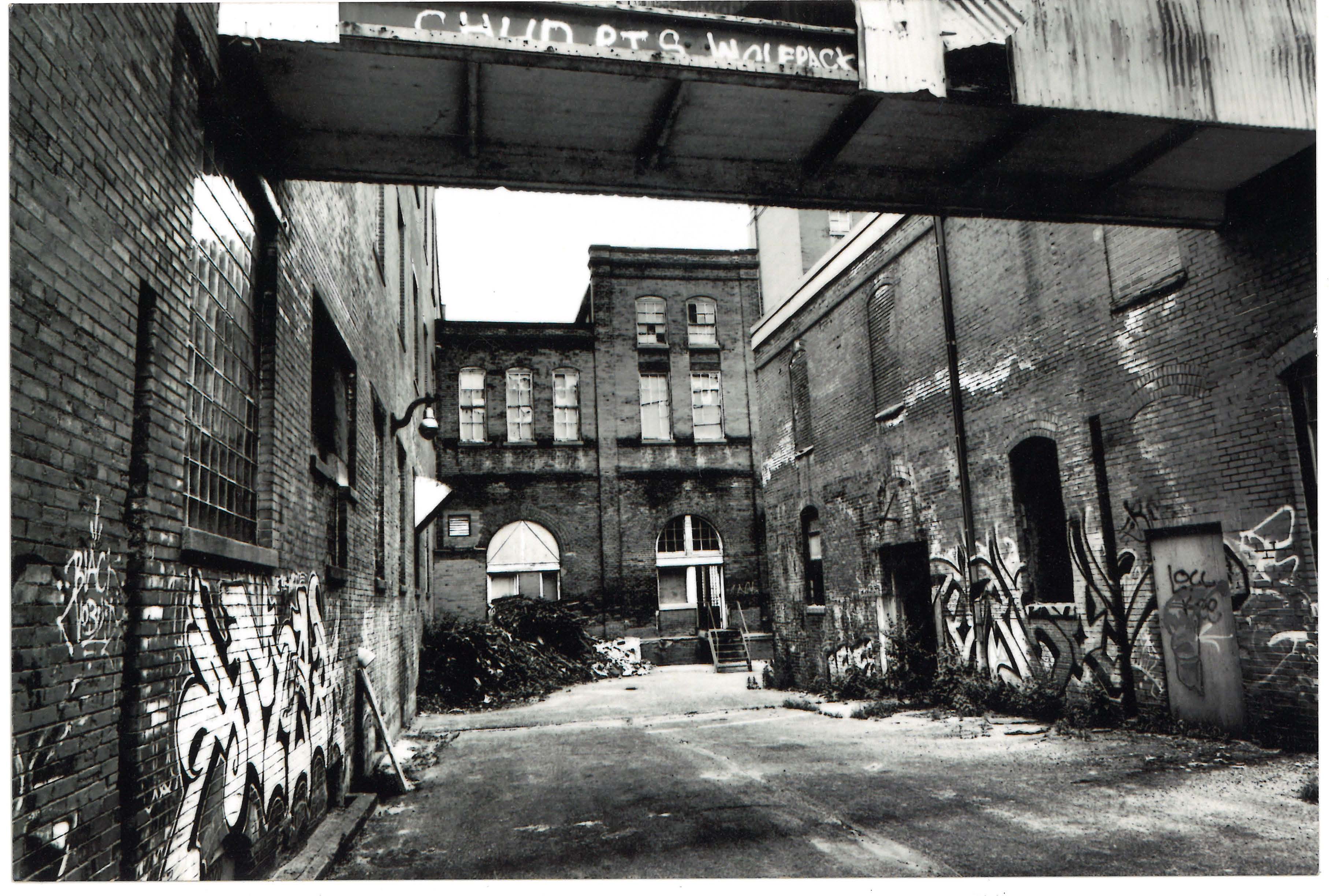Black and white photo of the building that is now Saint Paul Brewing before it was restored from abandonement.