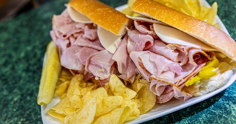 Ham sandwiches and potato chips