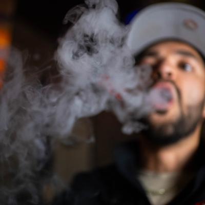 Customer smoking a hookah.