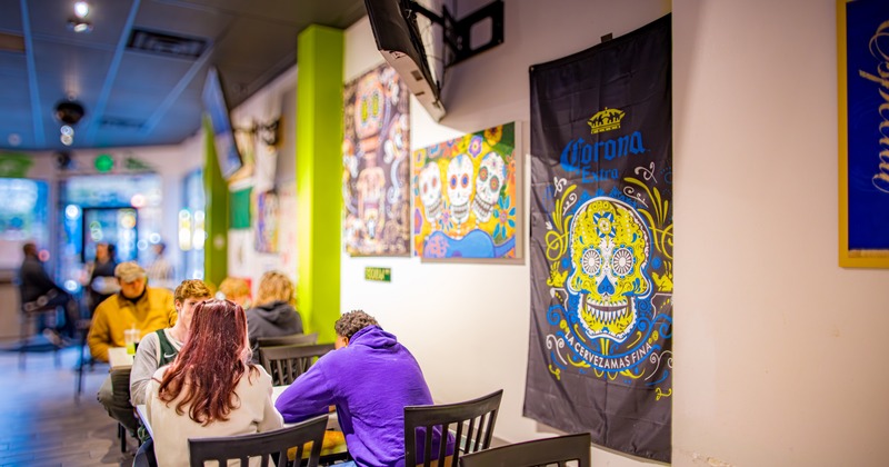 Interior, diner area, tables and chairs, people