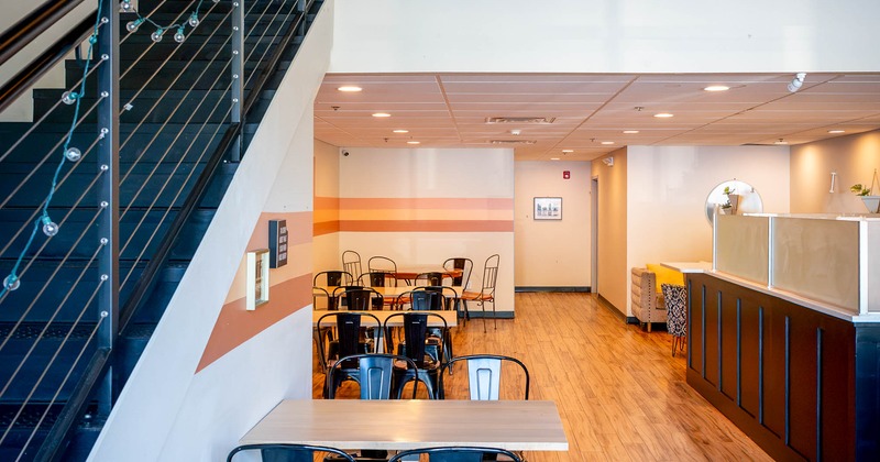 Interior, tables and chairs in seating area