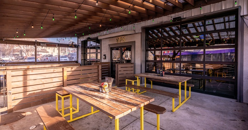 Patio, table bench sets ready for guests