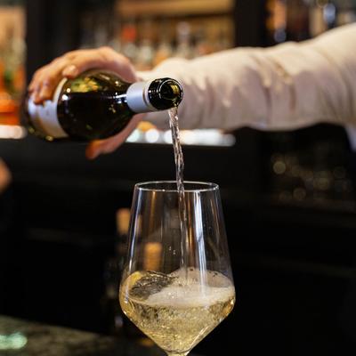 glass of wine being poured.