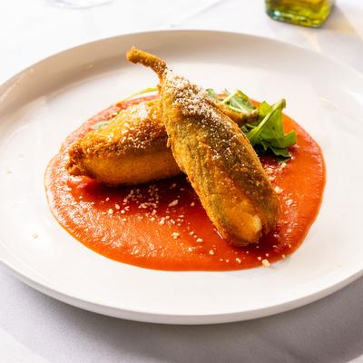 Zucchini fritters, with sauce.