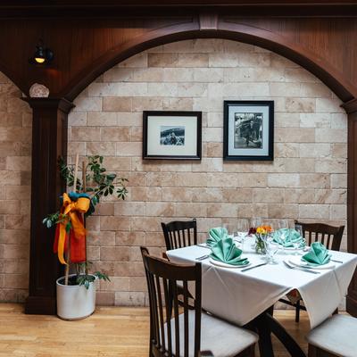Dubrovnik, a set table in a dining area and decor.