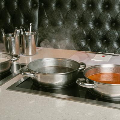 Grill table with pots.