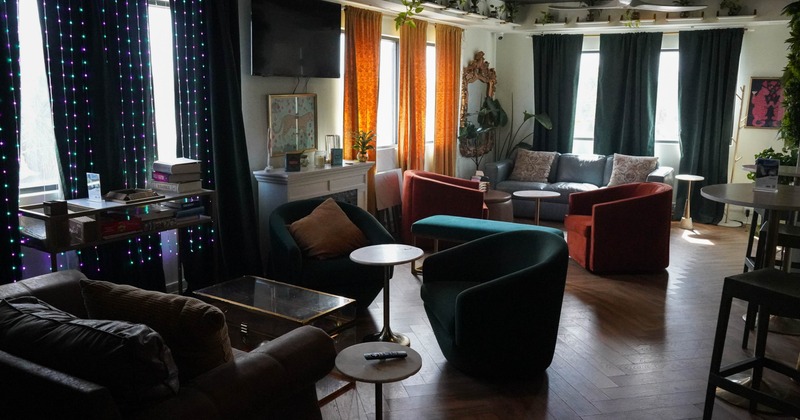 Interior, seating area with chairs, sofas and tables