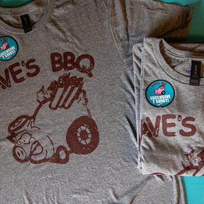 Gray t shirts with Dave's BBQ and the logo printed on them.