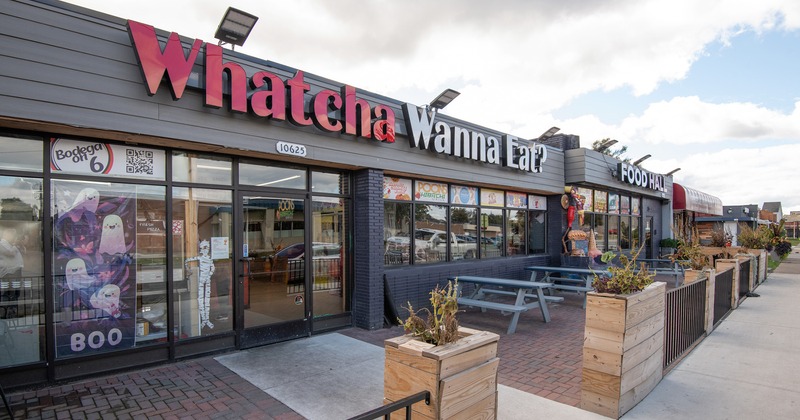 Outdoor seating area, wooden tables with benches